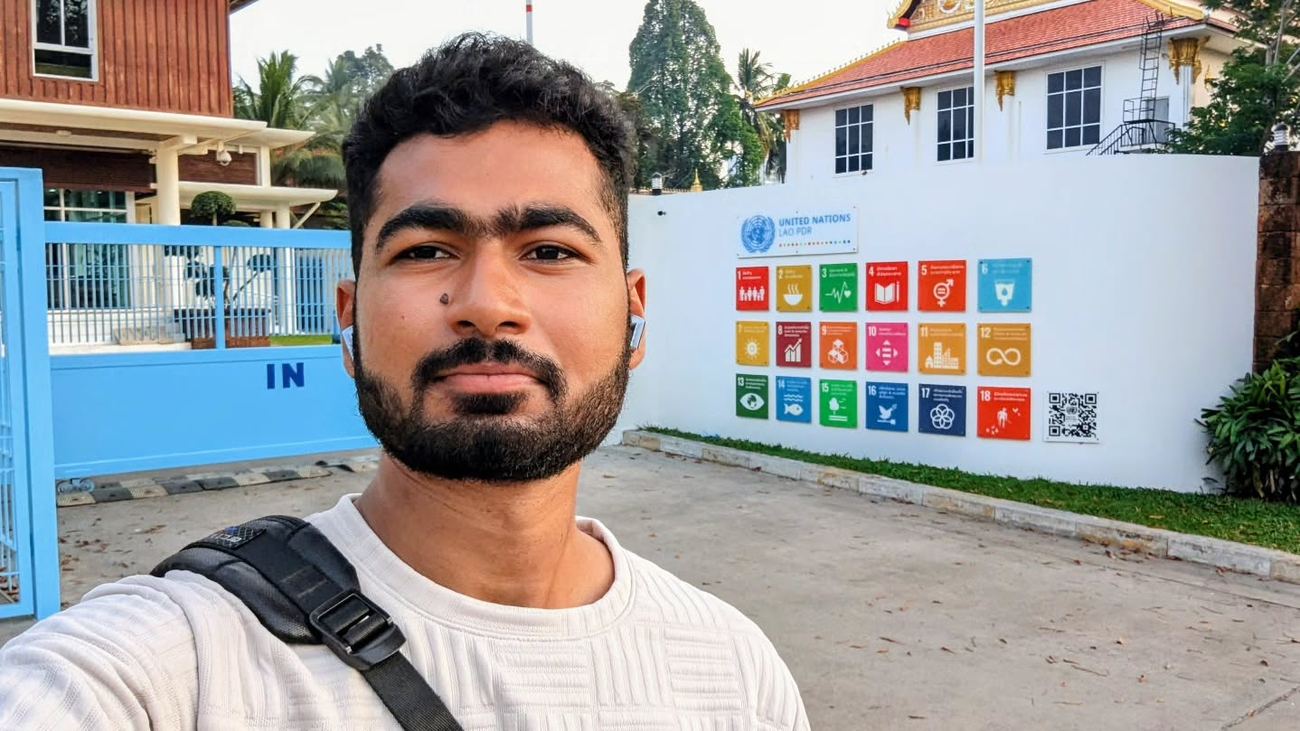 Kadiri Raghu Vamsi at the United Nations office in Lao PDR with the SDG board
