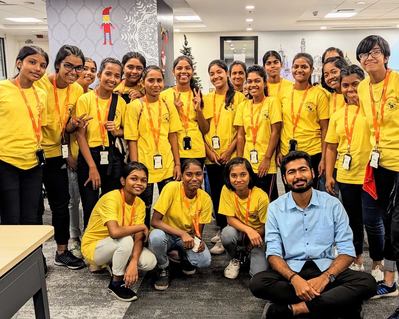 Kadiri Raghu Vamsi mentoring underprivileged girls during a corporate office visit at EY